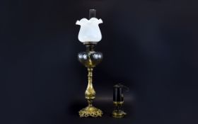 Antique Brass Oil Lamp And Miners Lamp An impressive brass based oil lamp with scroll design to