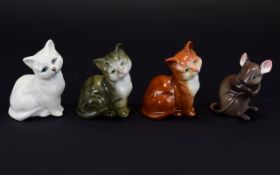 Beswick Cat Figures ( 3 ) + a Mouse Figure. Comprises 1/ Kitten Seated.