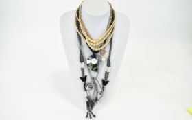 A Collection Of Contemporary Hematite Metal And Resin Necklaces Five in total to include collar