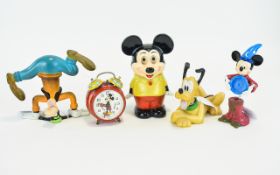 Collection of Walt Disney Collectables. Includes Mickey Mouse Alarm Clock, Pluto Nodding Figure,