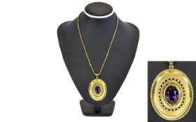 A Fine 9ct Gold Oval Shaped Pendant Set with a Large Faceted Amethyst of Excellent Colour, To Centre