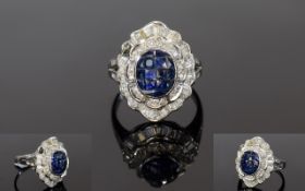 18ct White Gold Diamond and Sapphire Cluster Ring. Flower head Setting. Marked 750.