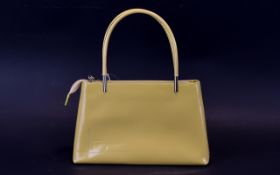 Salvatore Ferragamo 1980's Vintage Bag Pale cream patent top handled bag with silver hardware,