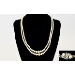 A Nice Quality Double Strand Cultured Pearl Necklace, with 18ct Gold Set Diamond and Sapphire Clasp,