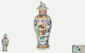 Chinese - Famille Verte 19th Century Pair of Lidded Vases, Decorated with Painted Enamel Scenes of