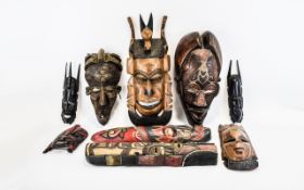 A Large Collection Of Tribal Masks Nine in total of various forms, sizes and colours,