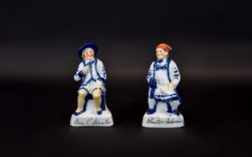 Conta and Boehme Blue and White Pair of Porcelain Figurines. c.1870 / 1880.