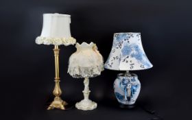 A Collection Of Small Table Lamps Three in total to include blue and white ceramic with attached