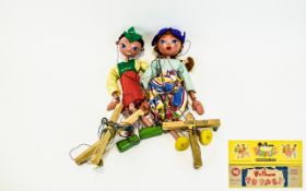 Two Pelham Puppets comprising Tyrolean Boy and Type LS girl. C1960. Both with original boxes.