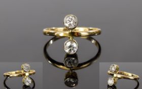 18ct Gold Set Two Stone Diamond Ring. The Cushion Cut Diamonds of Good Colour and Clarity.