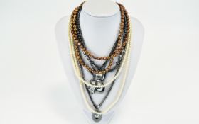 A Collection Of Contemporary Hematite Necklaces Six in total of varying lengths.