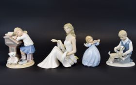 A Small Collection Of Leonardo Ceramic Figurines Four in total, each in muted blue,
