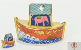 A Royal Crown Derby Paperweight In The Form Of Noah's Ark Small ceramic paperweight finished with