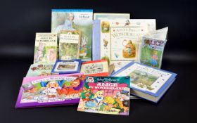 Large Collection of Alice In Wonderland Hard Back Books.