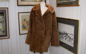 Astrakhan Vintage Coat Three quarter brown Persian lamb coat, front patch pockets, revere collar and