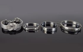 A Collection of Mid 20th Century Solid Silver Hallmarked Bangles and Bracelet.