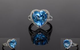 14ct White Gold Diamond & Topaz Ring, Central Heart Shaped Blue Topaz (Approx 6.75cts) Surrounded By