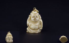 Antique Period Jade Figural Pendant In The Form of Buddha Set In Hight Ct Gold Mounts. Wonderful