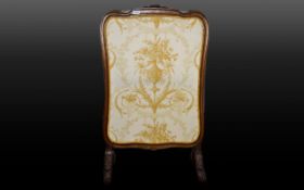 Reproduction Carved Fire Screen Vintage fire screen in ovoid form with central cream jacquard panel.