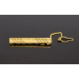 18ct Gold - Gentleman's Tie Clip with Attached 18ct Gold Safety Chain.