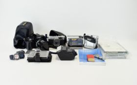 Box of Cameras/ Watches including Sony Handycam 12x Optical zoom with user guides,