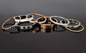 Collection of Michael Kors Bangles (8) in total.