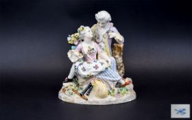 After Meissen Romantic Figure Group showing a young couple in 18thC dress, in a countryside setting,