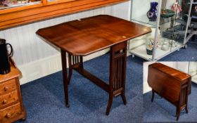 Mahogany Drop Leaf Table of Small Proportions.