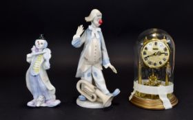 A Pair Of Ceramic Clown Figures Two in t