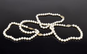 Four Row Cultured Pearl Necklace with 9c