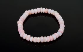 Natural Pink Opal Rondelle Bracelet, pink opal, mined in Peru, totalling approximately 75cts,