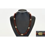 A Contemporary Nice Quality Natural Amber Bead Necklace with Pearl and 9ct Gold Spacers,