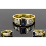 18ct Yellow Gold Baguette Diamond and Sapphire Ring. Marked 750 - 18ct.