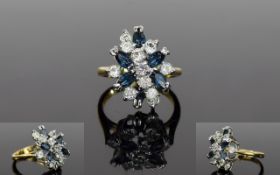 18ct Diamonds and Sapphires Set Cluster Ring. From The 1970's, Flowerhead Setting.