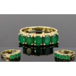 Ladies 14ct Gold Channel Set Emerald Ring. The Five Emeralds of Good Colour. Marked 14ct - 585.