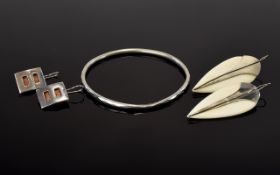 A Collection Of Mixed Silver And Ivory Vintage Jewellery To include hammered silver bangle,