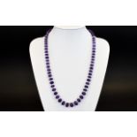 A Top Quality and Impressive Amethyst Graduated Necklace Set with Pearl Spacers and 18ct Gold Clasp