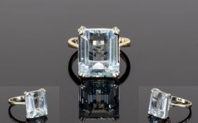 18ct Gold Set Single Step-cut Aquamarine Dress Ring.