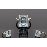 18ct Gold Set Single Step-cut Aquamarine Dress Ring.