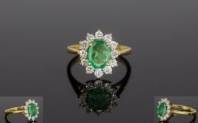 18ct Gold Emerald & Diamond Cluster Ring. The Oval Emerald Surrounded by 13 Diamonds. The Emerald of