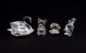 A Collection Of Swarovski Crystal Miniature Figures Four in total,