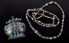 Long Silver Multi Bead Necklace plus turquoise and amethyst set white metal pendant;