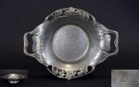 Archibald Knox British ( 1864 - 1933 ) Liberty and Co Twin Handle Pewter Bowl with Openwork Organic