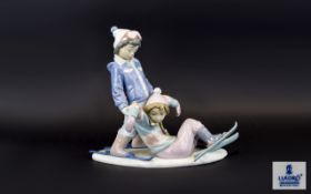 Lladro Porcelain Figure Group ' One More Try ' Model Num 5997. Boy and Girl on Skis. Retired. 10.