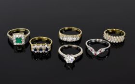 Six Silver Gemstone Rings To include wishbone shape set with red crystals,