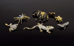 A Collection Of Crystal Set Statement Brooches Seven in total to include attractive black enamel