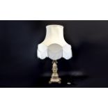 Standard Lamp On neoclassical gold tone column base with acanthus leaf trim and large cream shade.