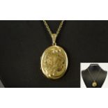 A 1970's 9ct Gold Oval Shaped Hinged Locket,