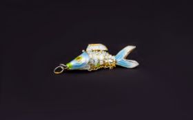 Enamel Fish Pendant Articulated pendant with blue and green enamel detailing in gold tone metal