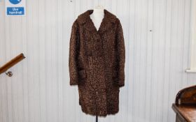 Astrakhan Vintage Coat Three quarter brown Persian lamb coat, front patch pockets, revere collar and